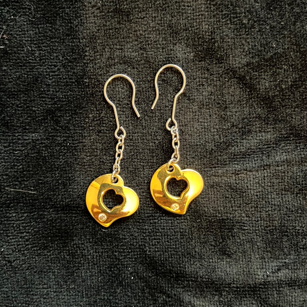 Plated gold hearts, unsure if chain and hooks are gold.